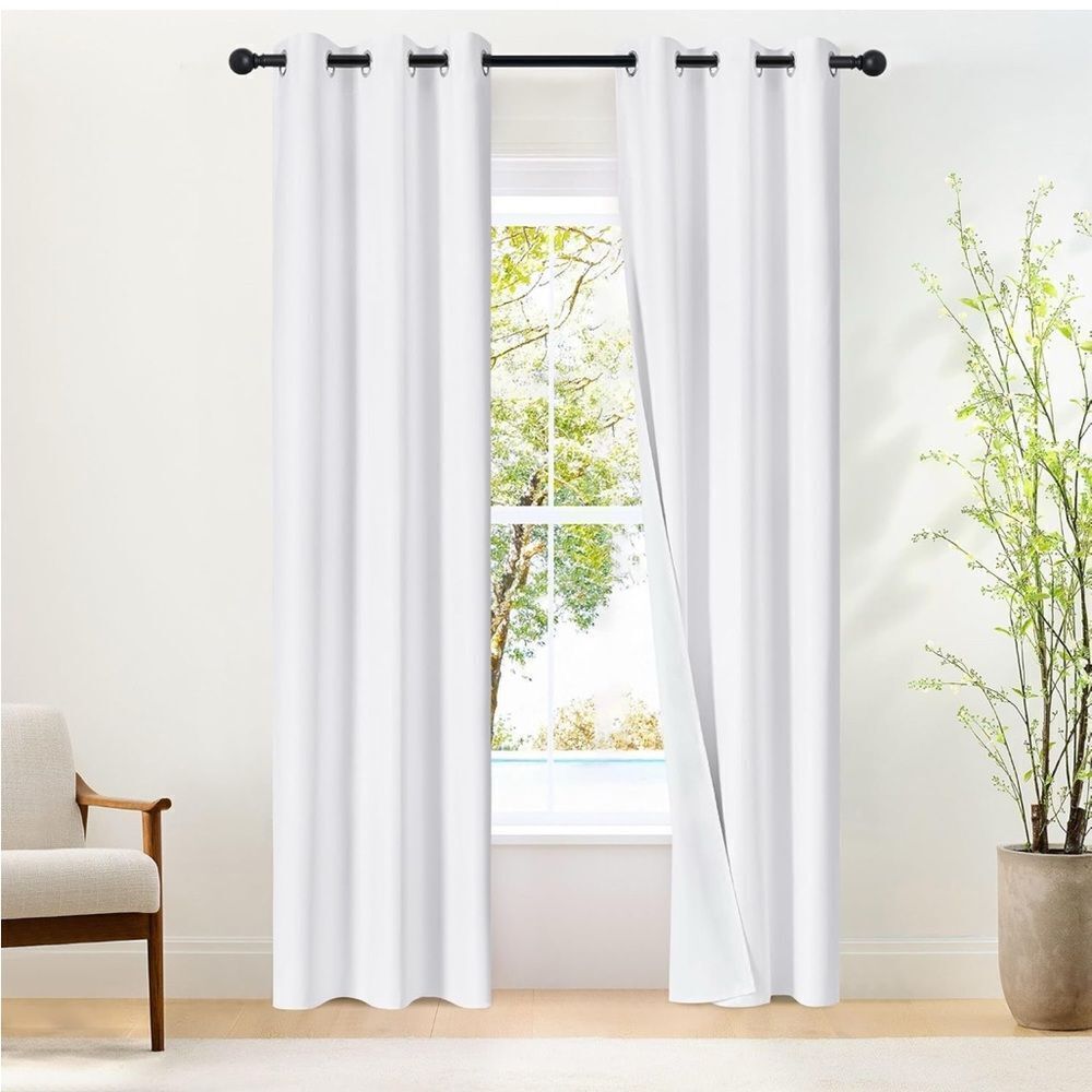 52 x 72 pair pure white blackout curtains. 1.6 silver Grommet